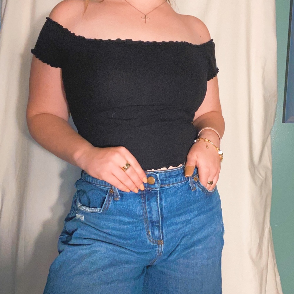 Off the shoulder ruffled black top